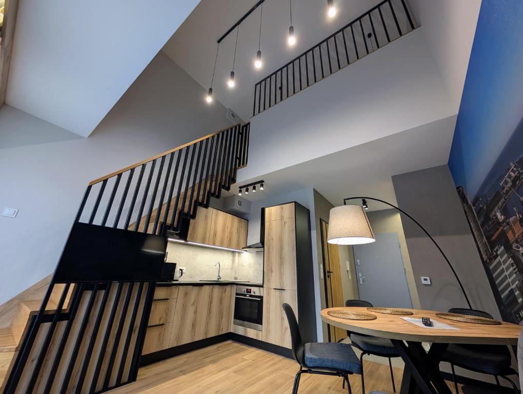 Salon z kuchnią / Living area with kitchen